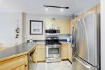 Renovated kitchen with stainless steel appliances